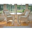Heronswood dining armchair shown with matching table