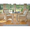 Heronswood dining table with two dining armchairs