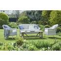 Stanway teak garden coffee table shown here with the Chatto garden sofa and armchairs.