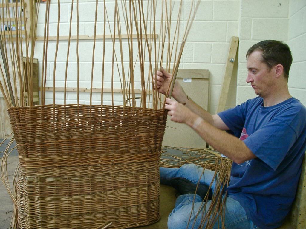 Weaving a willow chair