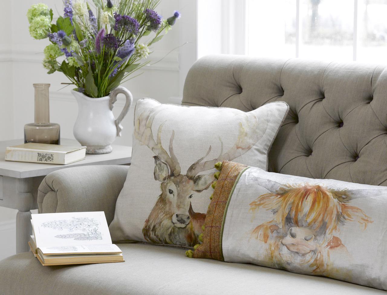 Highland cow and stag cushion